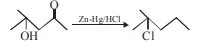 Reaction scheme showing a carboxylic acid containing substrate treated with Zn-Hg and HCl, leading to substitution by chlorine instead of desired alcohol formation.